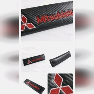 2 Mitsubishi Embroidery Logo Seat Belt Cover Shoulder Pads. Other Cars available
